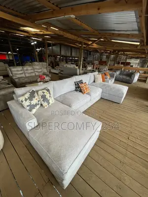 A Massive Bulky Nine Seater U Shape Couch