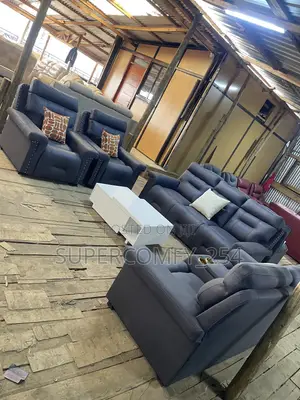 An Executive New Modern Seven Seater Semi Recliner and Table