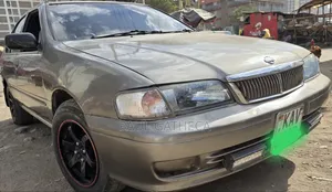 Nissan FB14 1999 Gold