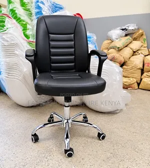 Black Executive Office Chair With Chrome Base and Wheels