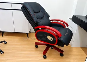 Black and Red Reclining Executive Office Chair With Padded Armrests