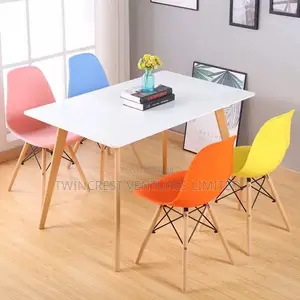 Modern Eames-Style Molded Plastic Dining Chairs With Wooden Legs