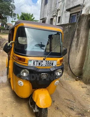 Bajaj RE 2024 Yellow