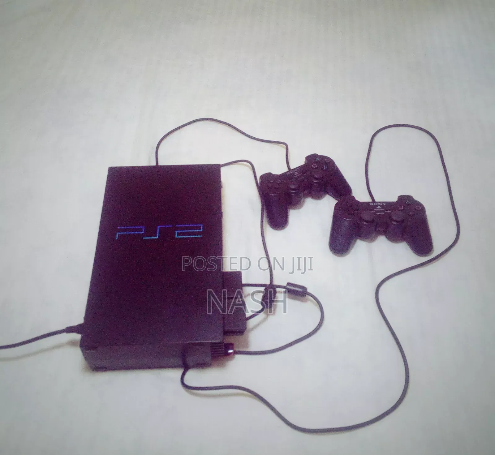 PlayStation 2 Chipped ,With 2 Controllers