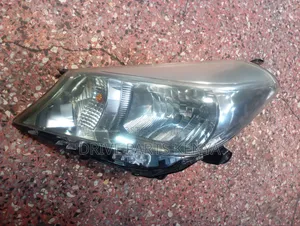Vitz Juwella 2013 Headlight