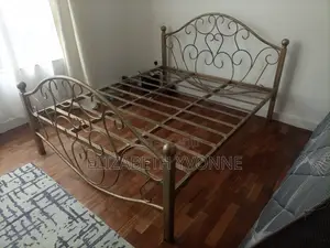 5 by 6 Bed. Metal.