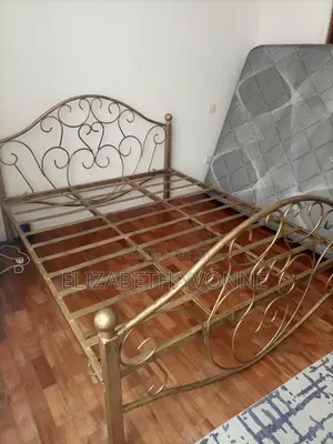 5 by 6 Bed. Metal.