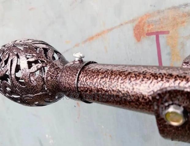 Smooth and Rough Powder Coated Bronze Curtain Rods - thumbnail 2