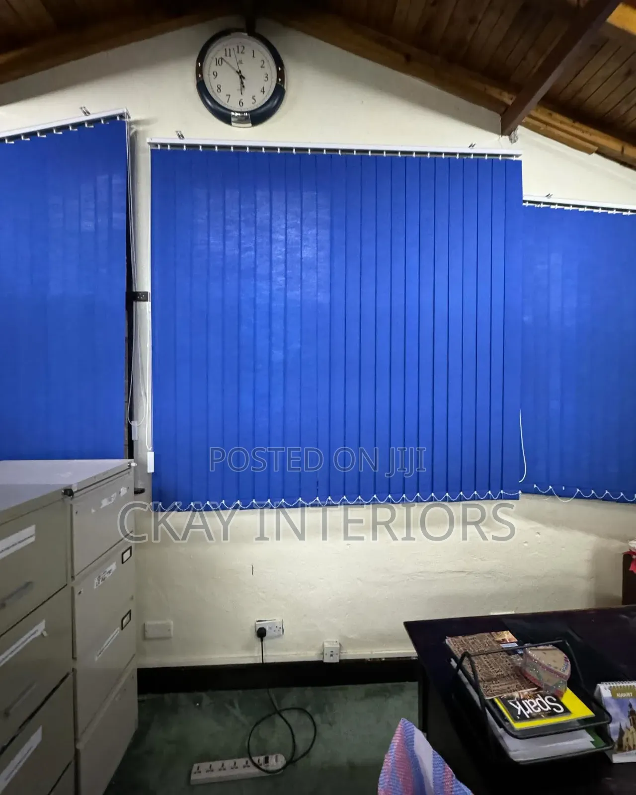 Turn Plain Windows Into Attractive Features With Blue Vertical Blinds