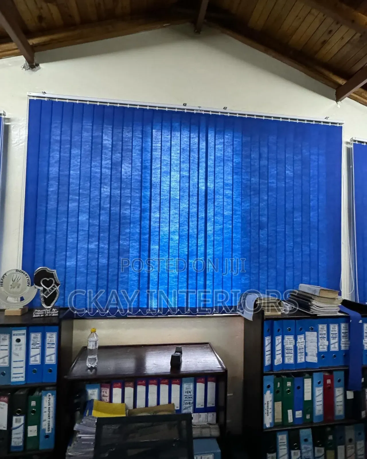 Turn Plain Windows Into Attractive Features With Blue Vertical Blinds