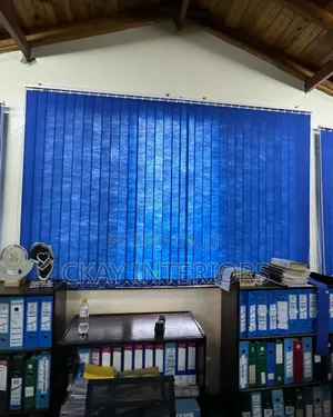 Turn Plain Windows Into Attractive Features With Blue Vertical Blinds