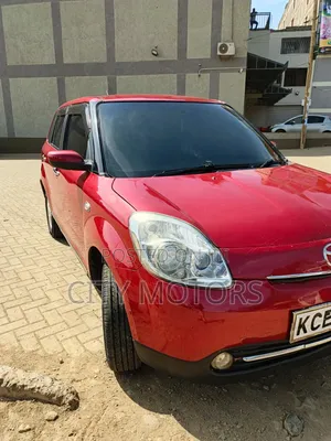 Mazda Verisa 2009 Red