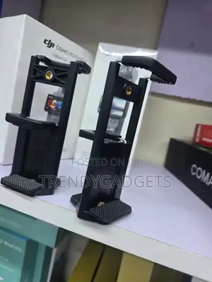 Adjustable Smartphone and iPad Tripod Mount Clip Holder
