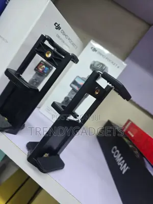 Adjustable Smartphone and iPad Tripod Mount Clip Holder
