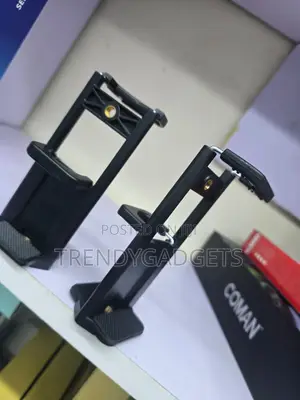 Adjustable Phone Holder Mount for Selfie Stick and Tripod