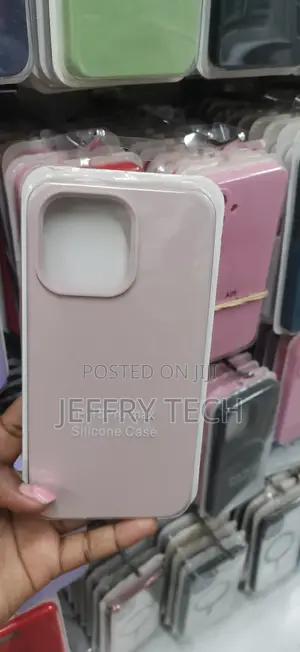 Light Pink or Dusty Rose Silicone Phone Case for iPhone 15 Pro Max.