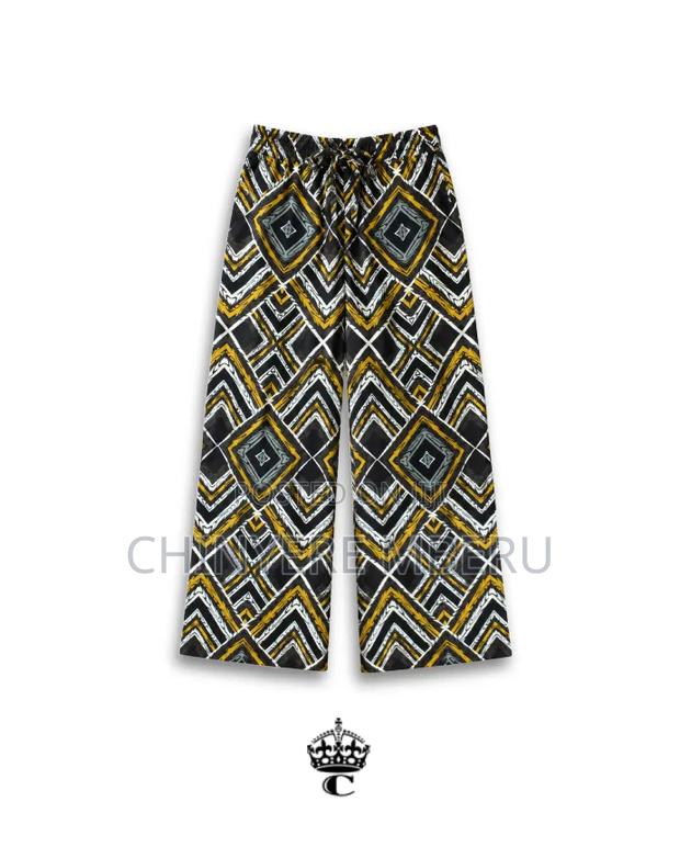 The Black, White & Gold Geometric Ankara Chichi Wide Leg Pants