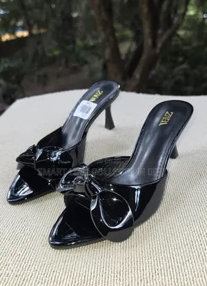 *Glossy Bowtie Slip-on Heels*