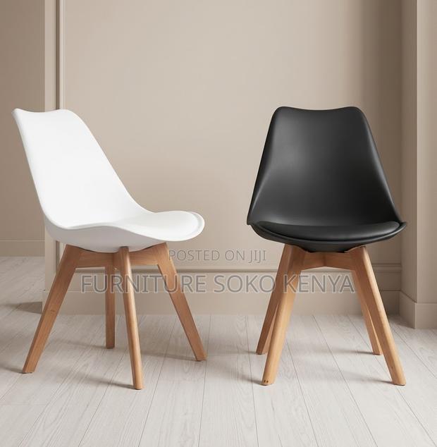 Home Chairs; Cushioned Armless Eames Vintta Chair - main view