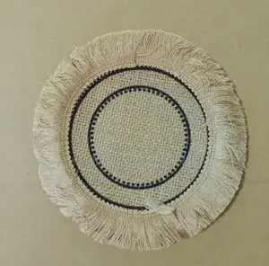 Brown Coaster With Black Inner Circles.