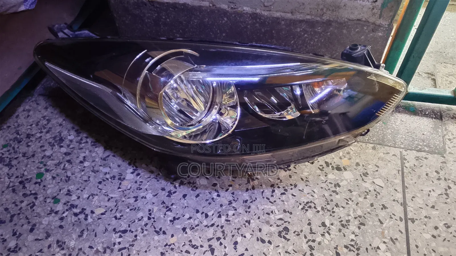 Headlight Mazda Demio 2013