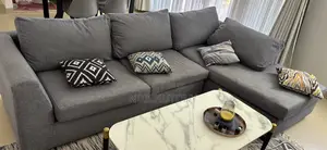 Comfortable Used Sofa and Throw Pillows Included