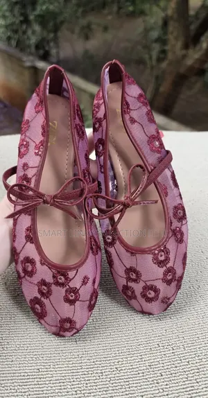 Floral Bow Tie Mesh Ballerina Flat.