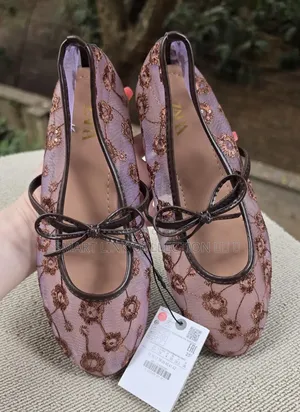 Floral Bow Tie Mesh Ballerina Flat.