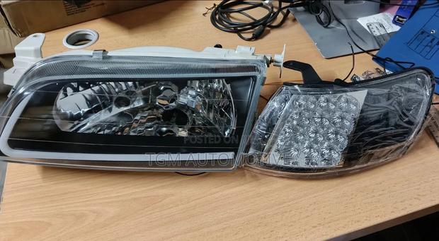 Aftermarket Toyota Corolla AE100/AE110 Front Lamp Units