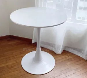 Minimalist Small Round Cafe Table With Single Stem Support