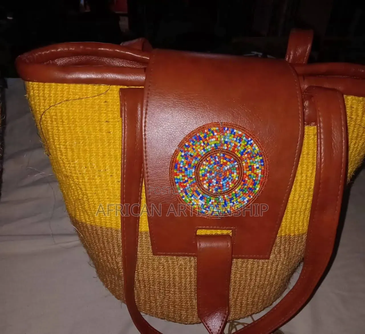 Woven Sisal and Hide Bags