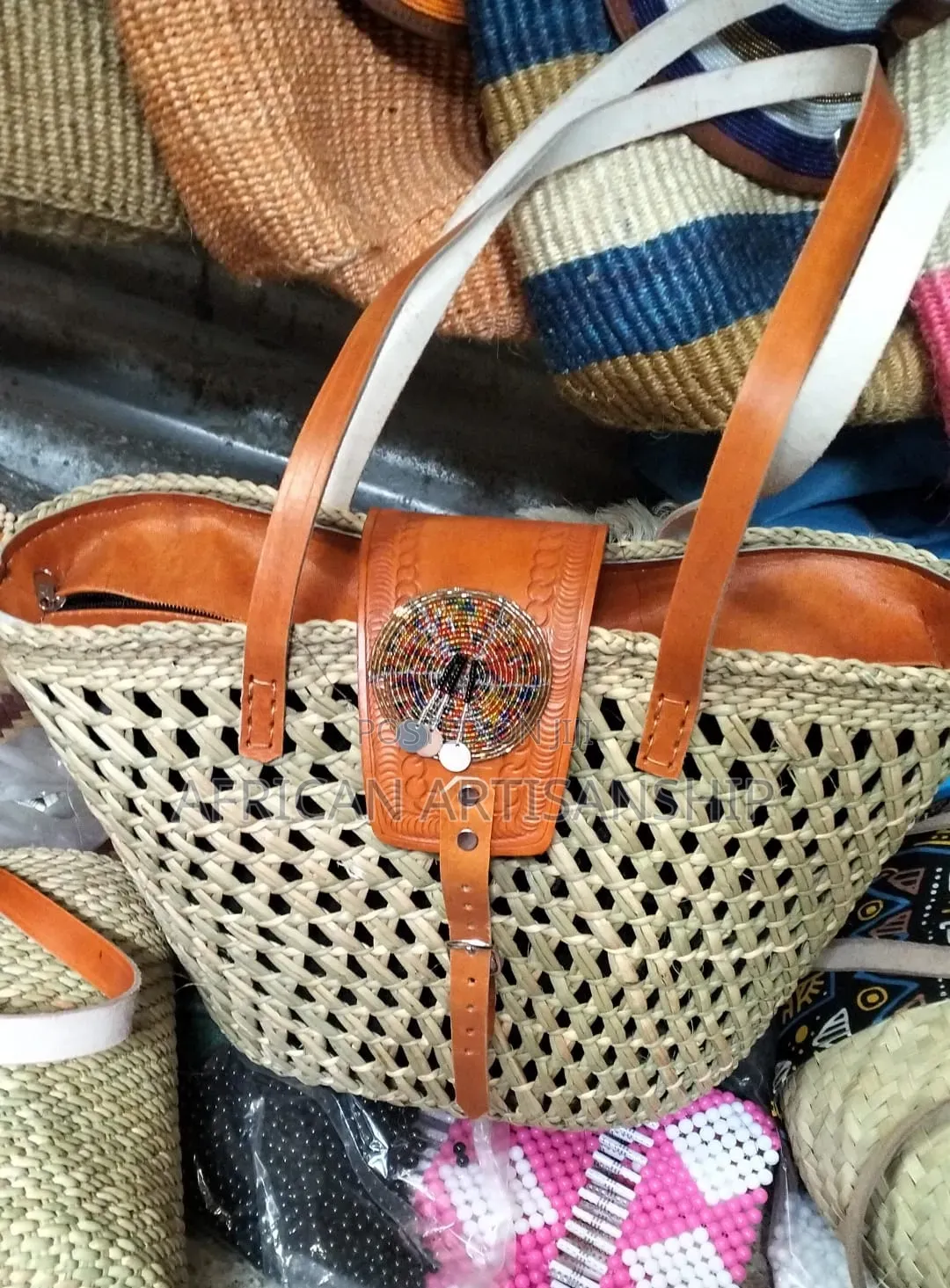 Woven Sisal and Hide Bags
