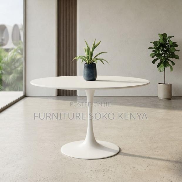 Coffee Table: Smooth White Round Office Accent Table - main view