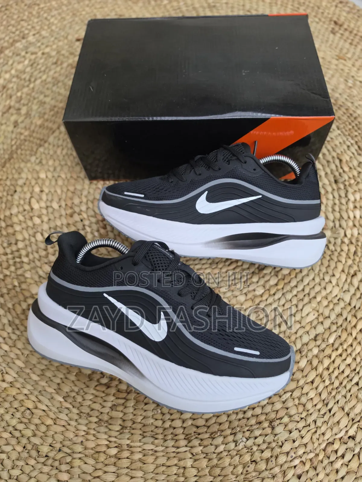 Nike Vomero Plus Black White Sole