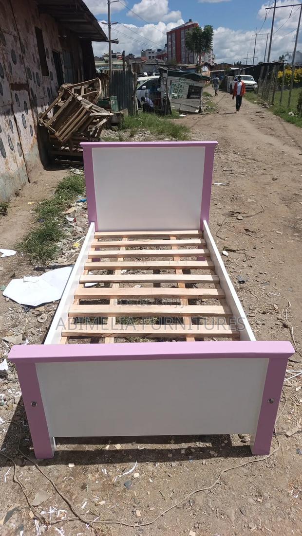 White Toddler Bed With a Touch of Pink
