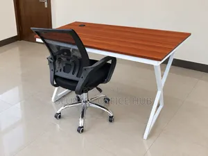Brown Office Desk With White Frame and Mesh Chair