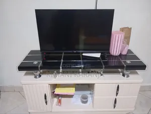 5-Seater Sofa, TV Stand, and 32-Inch Von TV.