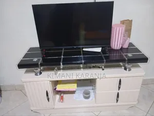 5-Seater Sofa, TV Stand, and 32-Inch Von TV.