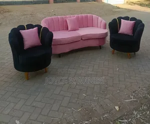 Stylish Flower Shaped, 5 Seater Sofa, Black and Pink. .