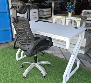 Headrest and White Metal Frame Table