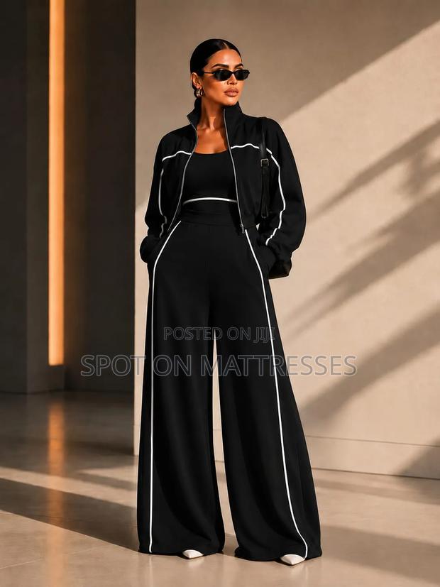 Women Zipper Stripped Tracksuits. Sizes Large - 2XL. We Deliver!