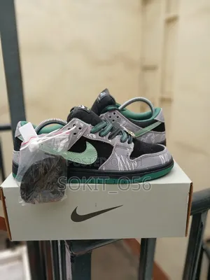 The There Skateboards X Nike SB Dunk Low Pro Sneakers.
