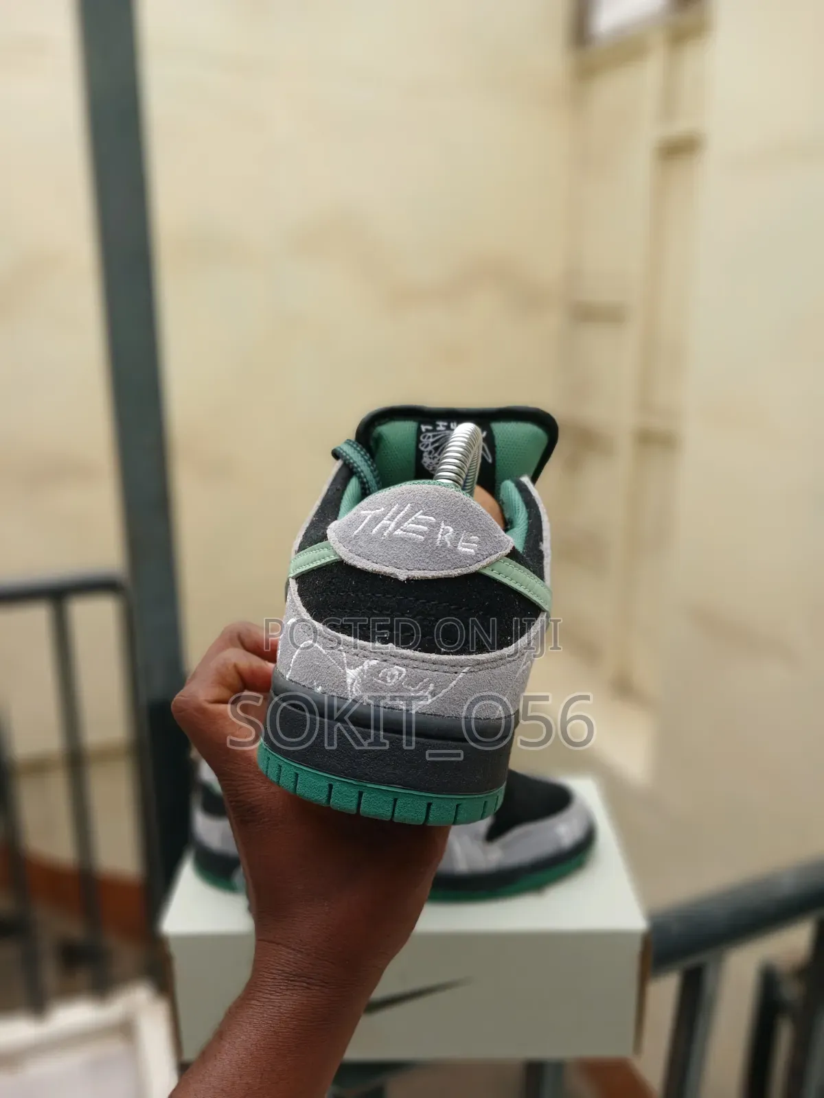 The There Skateboards X Nike SB Dunk Low Pro Sneakers.