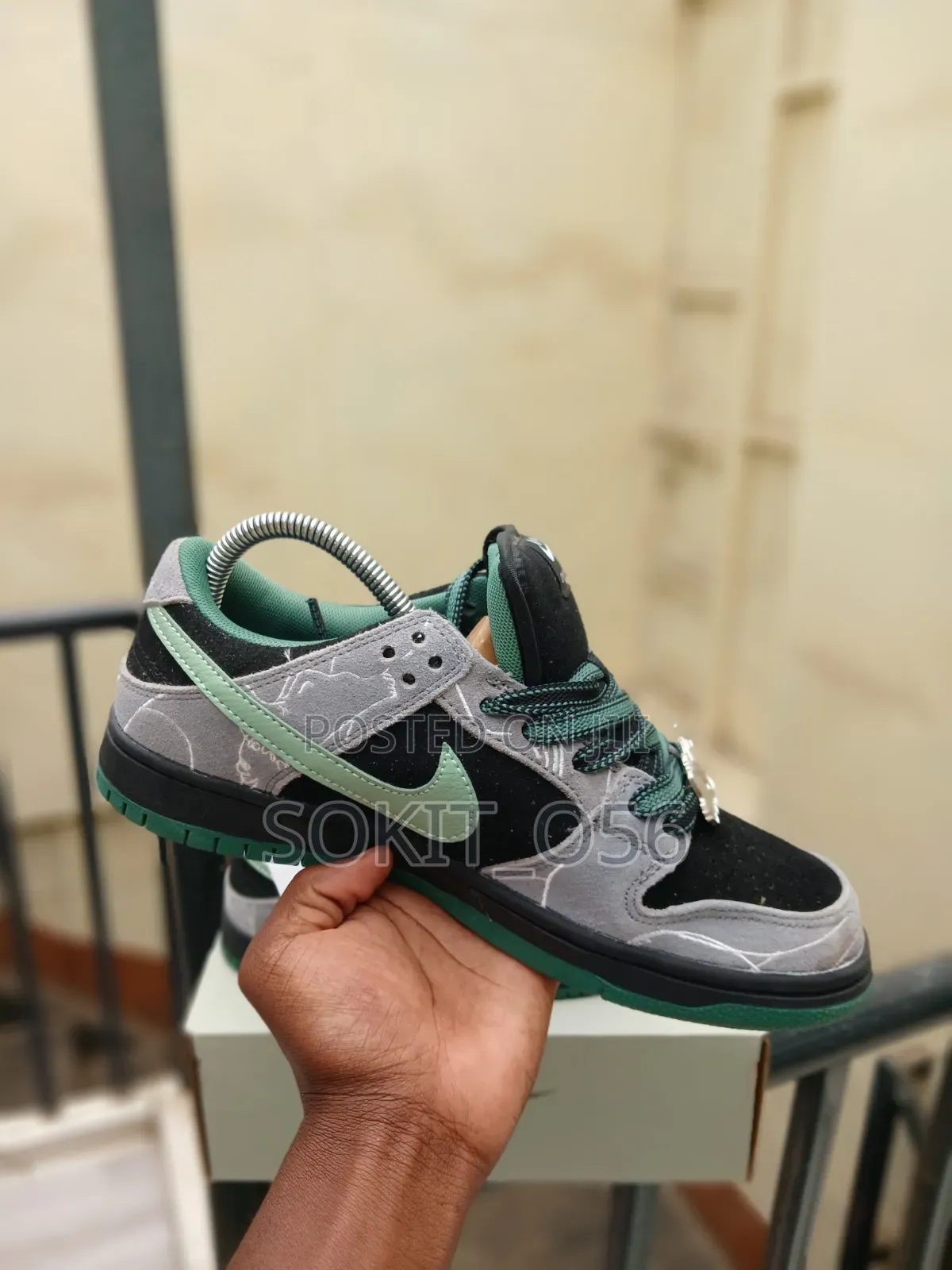 The There Skateboards X Nike SB Dunk Low Pro Sneakers.