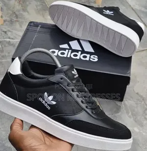 Adidas Casual Shoes for Men. Black/White and Gray. We Deliver!