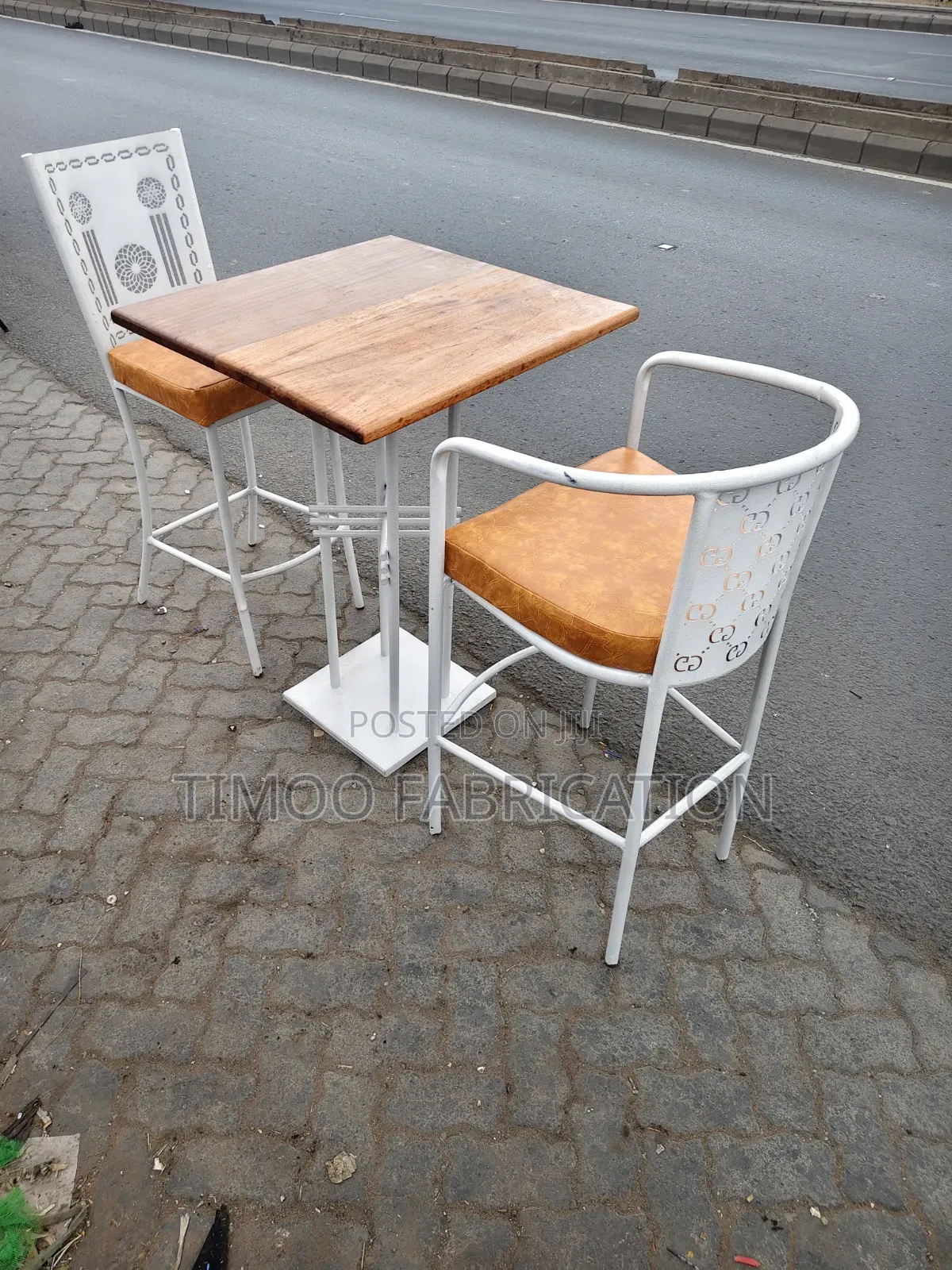 Restaurant White Chairs and Mahogany Table