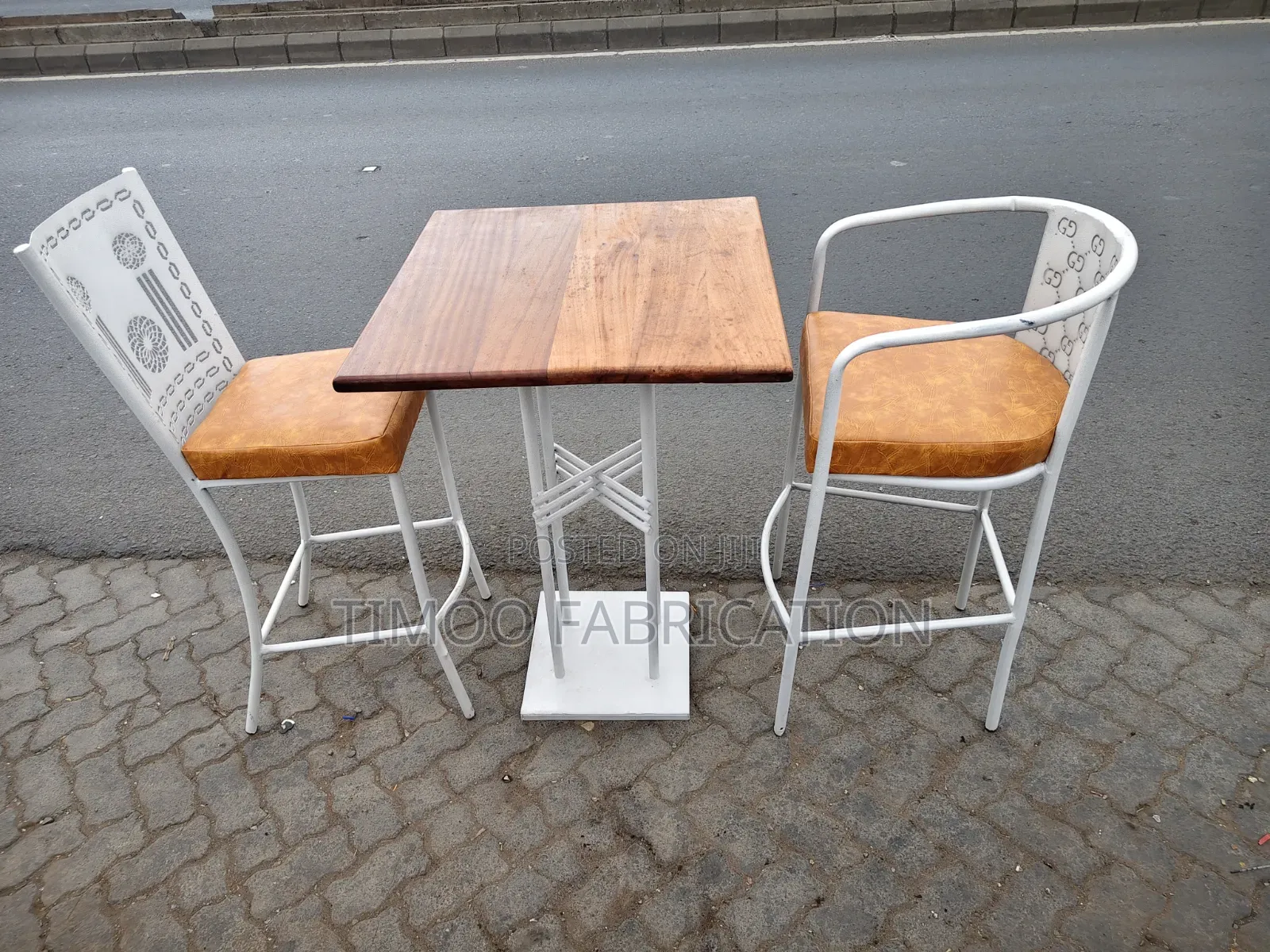 Restaurant White Chairs and Mahogany Table