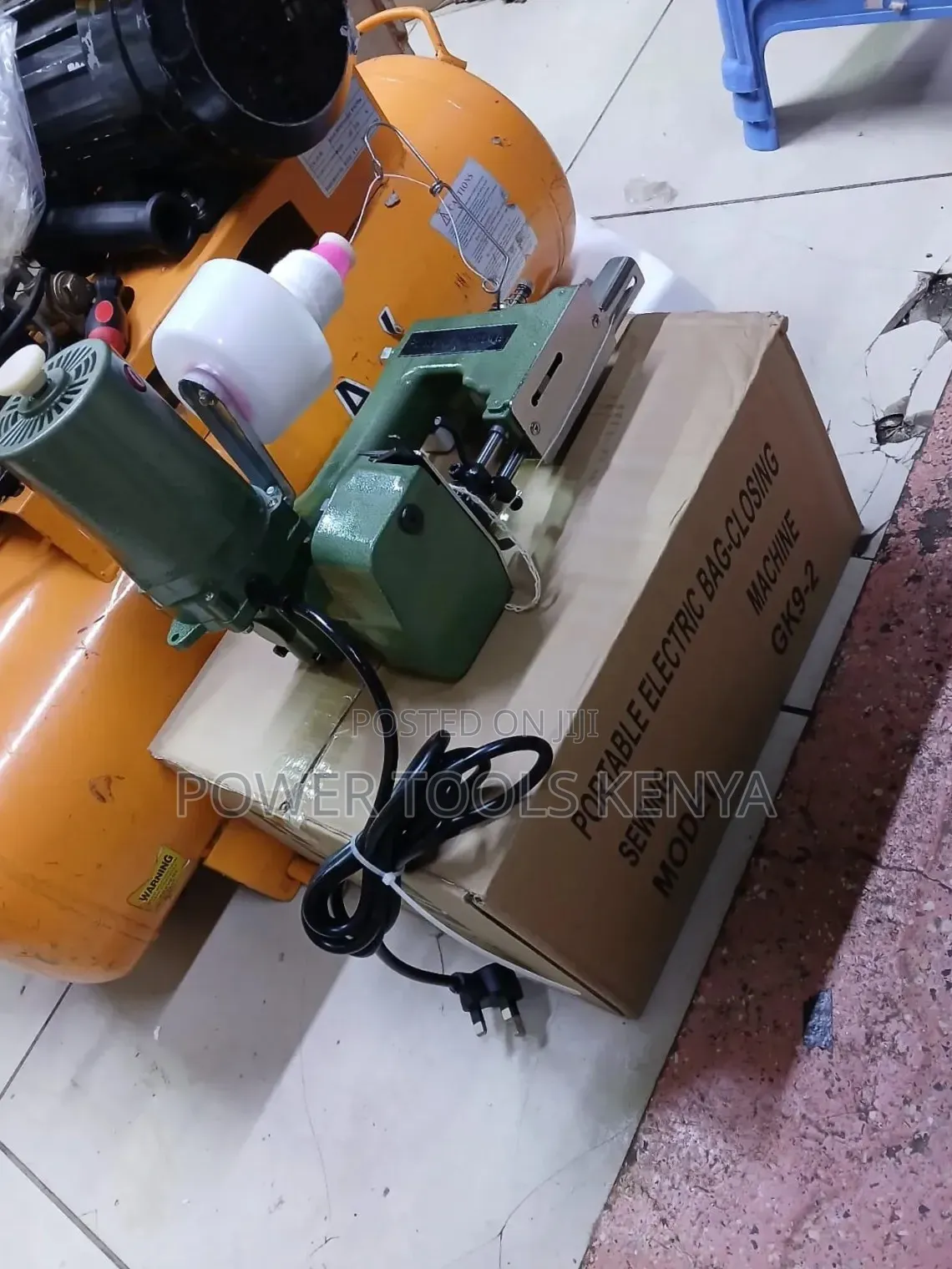 Portable Electric Bag-Closing Sewing Machine Resting on Its