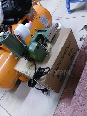 Portable Electric Bag-Closing Sewing Machine Resting on Its