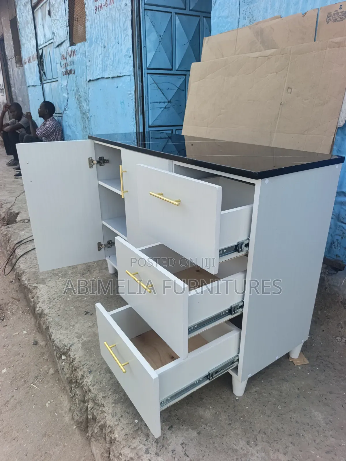 White Kitchen Cabinet With Black Marble Top